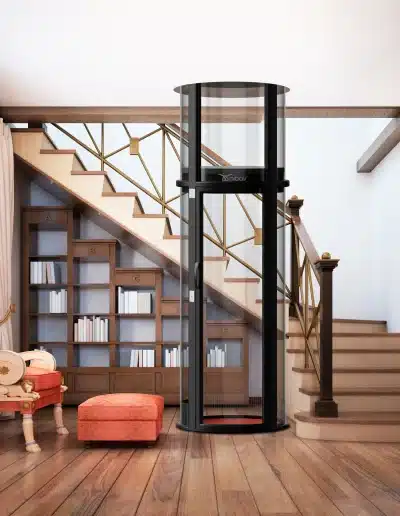 Glass elevator in a commercial building's lobby - Nibav Lifts